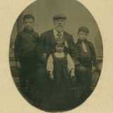 Granddad Stevenson with John, Allan and Lizzie
